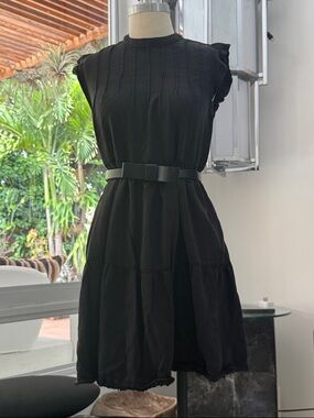 Soft cotton: Black Sleeveless Ruffle Tiered Babydoll mini dress